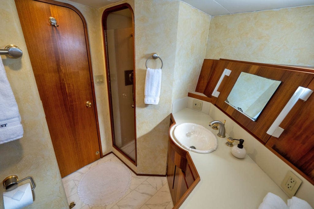a cabin bathroom on a small, luxury cruise ship