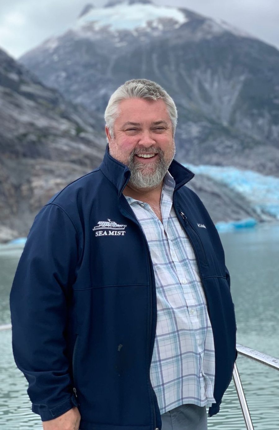 a photo portrait of Jeff; a tidewater glacier in background